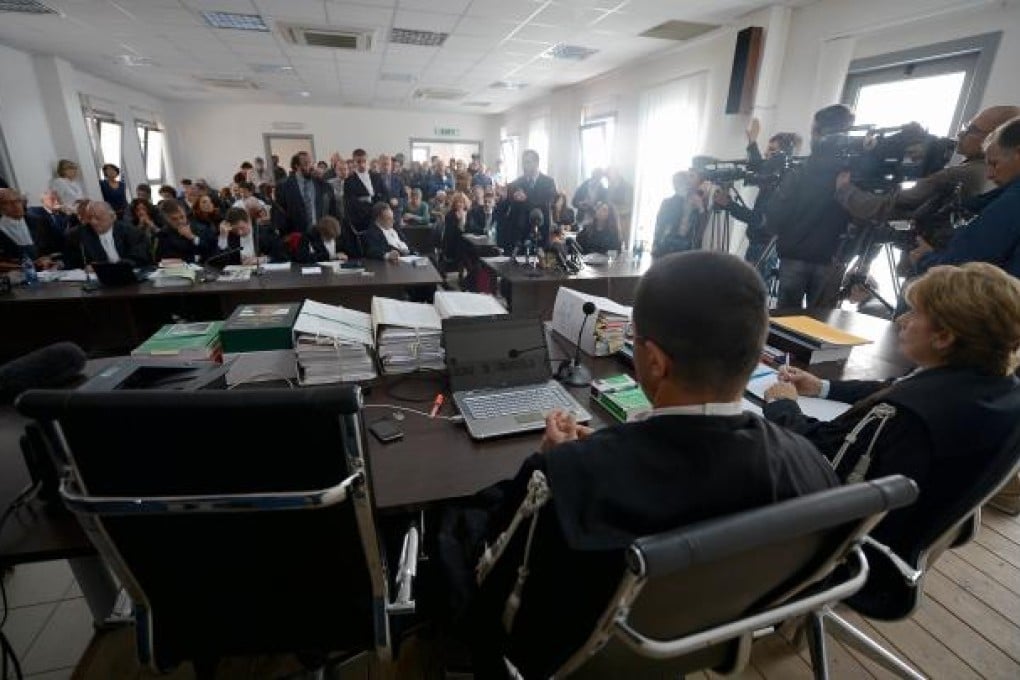 The trial of the six Italian scientists and government official charged with manslaughter for underestimating the risks of a killer earthquake in 2009. Photo: AFP