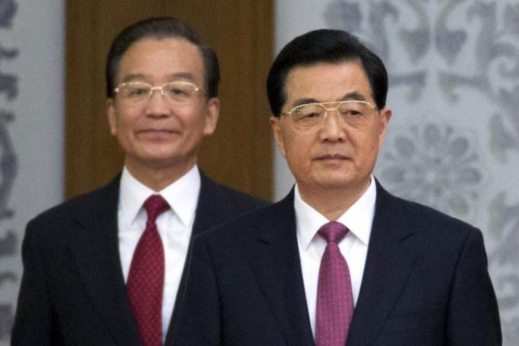 Heading for the exit, Wen Jiabao and Hu Jintao. Photo: AP