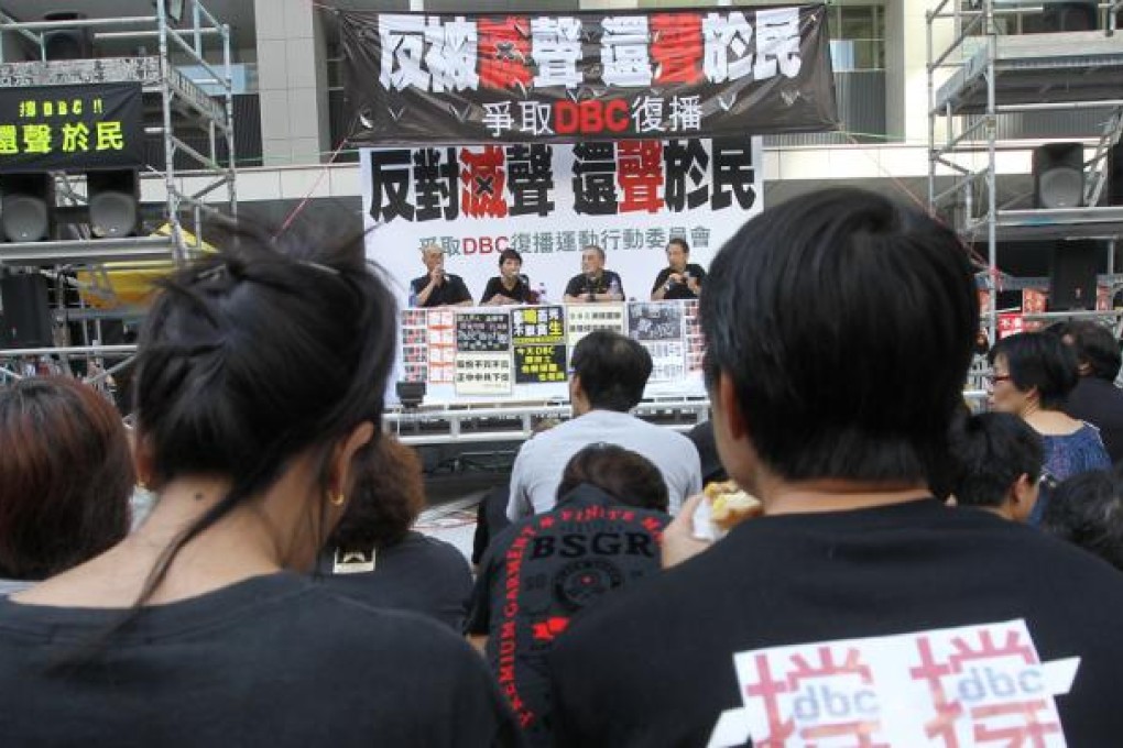 Protesters protest to request for a resumption of Digital Broadcasting Corporation and an investigation on the digital radio broadcaster's closure at People's Square outside Central Government Offices in Tamar. Photo: Edward Wong