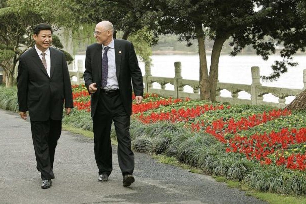 Xi Jinping with then US Treasury secretary Henry Paulson in 2006. Photo: AP