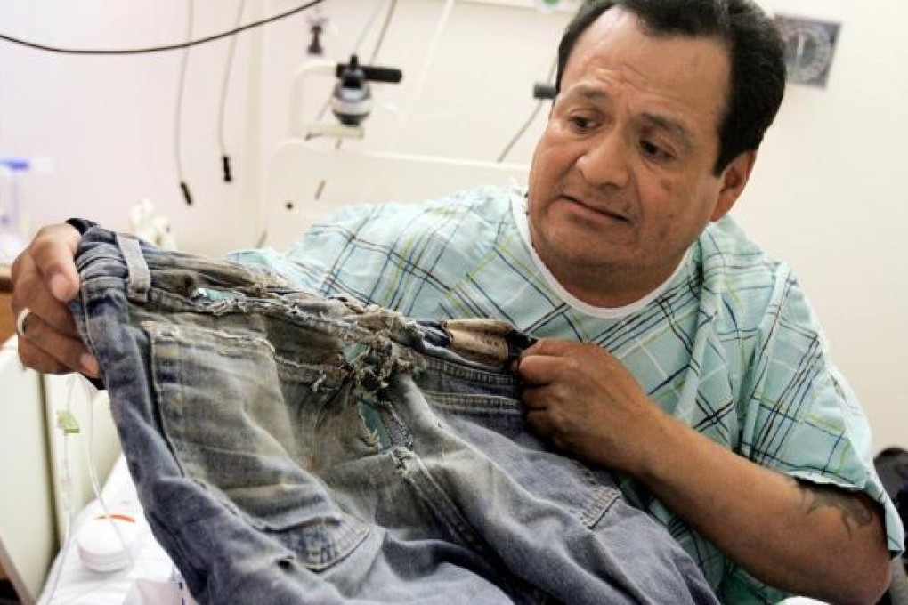 Ricky Gilmore, pictured with the jeans he was wearing. Photo: AP