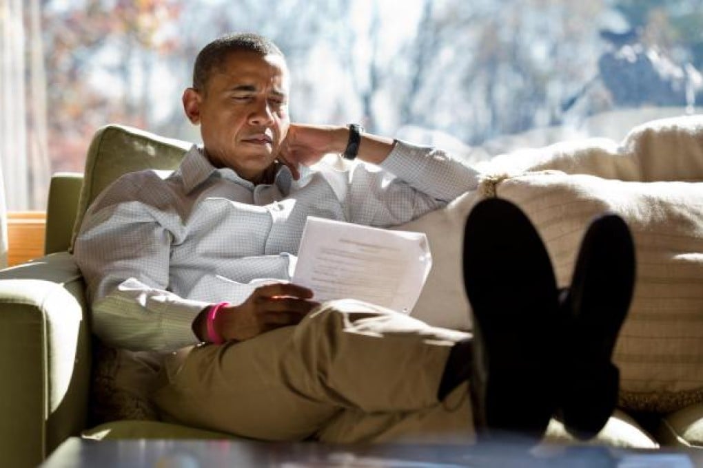 President Barack Obama is voting by post and casts his ballot today, more than a week before the November 6 election. Photo: AFP