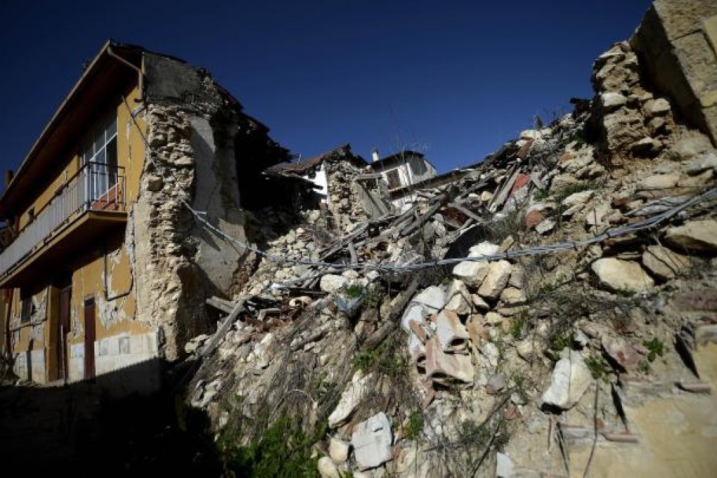 A damaged building in a village following the earthquake in L'Aquila.