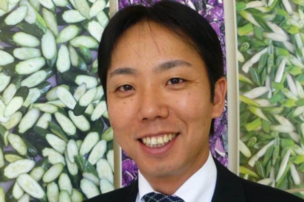 Yoshiyasu Ohzaki, president and CEO