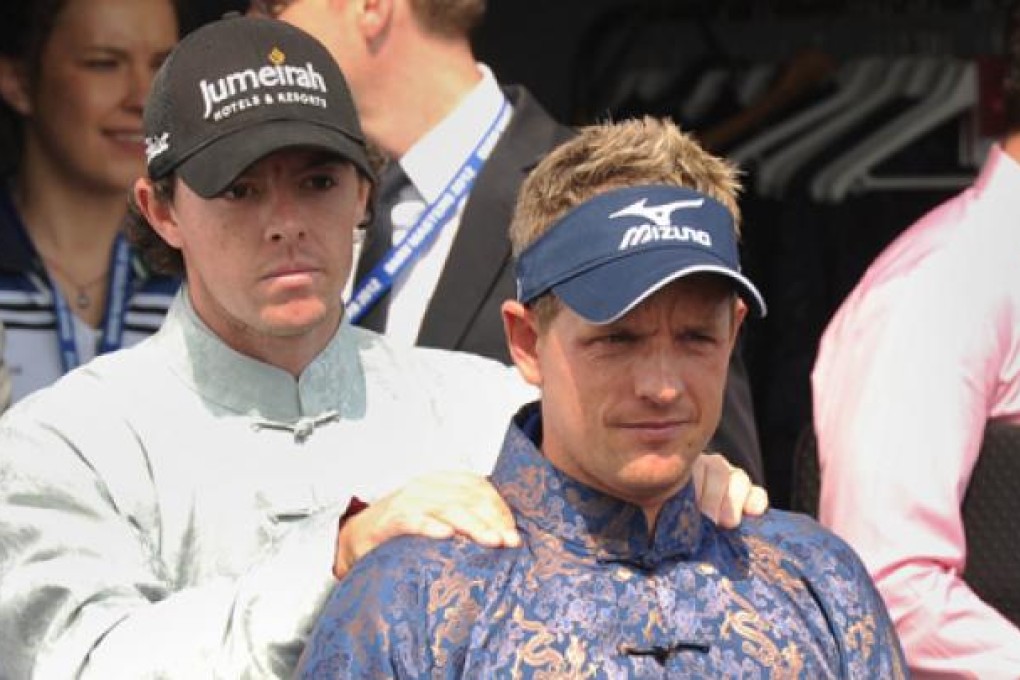 World No 1 golfer Rory Mcllroy, left, and Luke Donald, right, meet the media at the Lake Malaren Golf Club in Shanghai on Tuesday. Photo: AFP