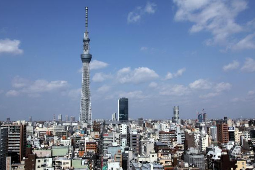 It is hoped that the Tokyo Sky Tree, a broadcast, restaurant and observation tower, which opened to the public in May, will help to revitalise the city. Photo: Bloomberg