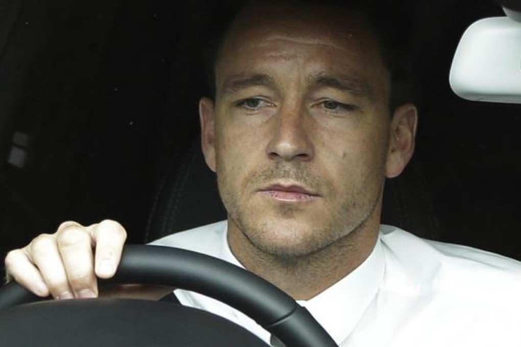 Terry was banned for four matches and fined £220,000 for racially abusing Anton Ferdinand. Photo: AP