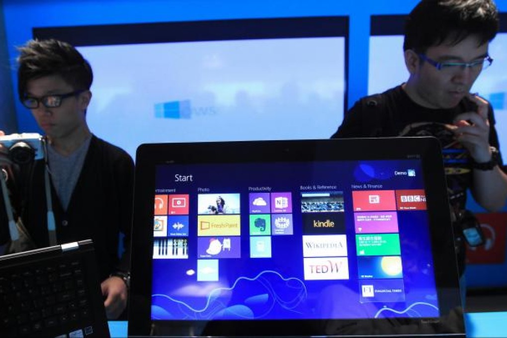 The new Windows 8 operating system was launched yesterday at the Happy Valley Racecourse. Photo: Jonathan Wong
