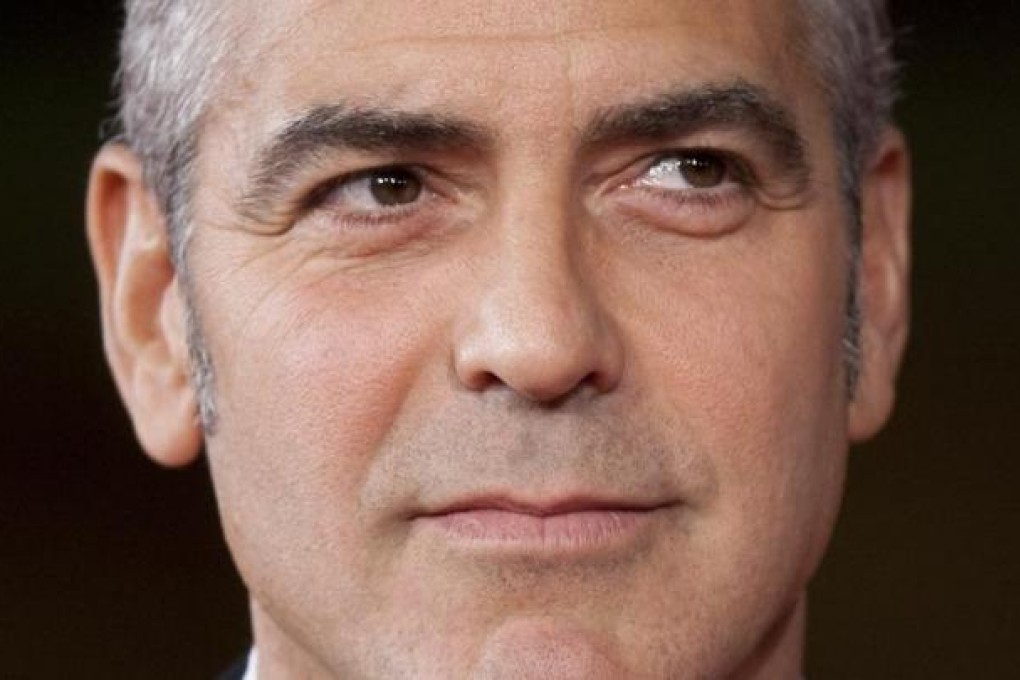 George Clooney and his Italian former fiancee Elisabetta Canalis (right) have been named as defence witnesses. Photo: AP