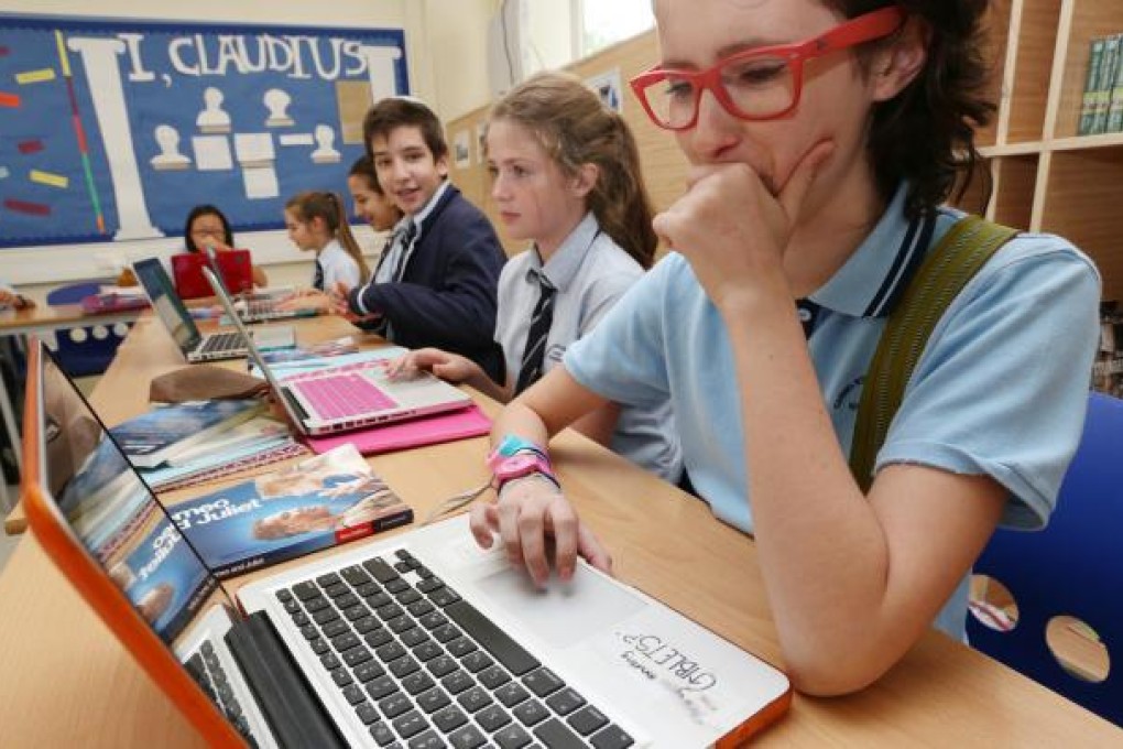 Laptops at the ready at Elsa High School in Shau Kei Wan, where class sizes can be as little as three and no bigger than 20. Photo: David Wong