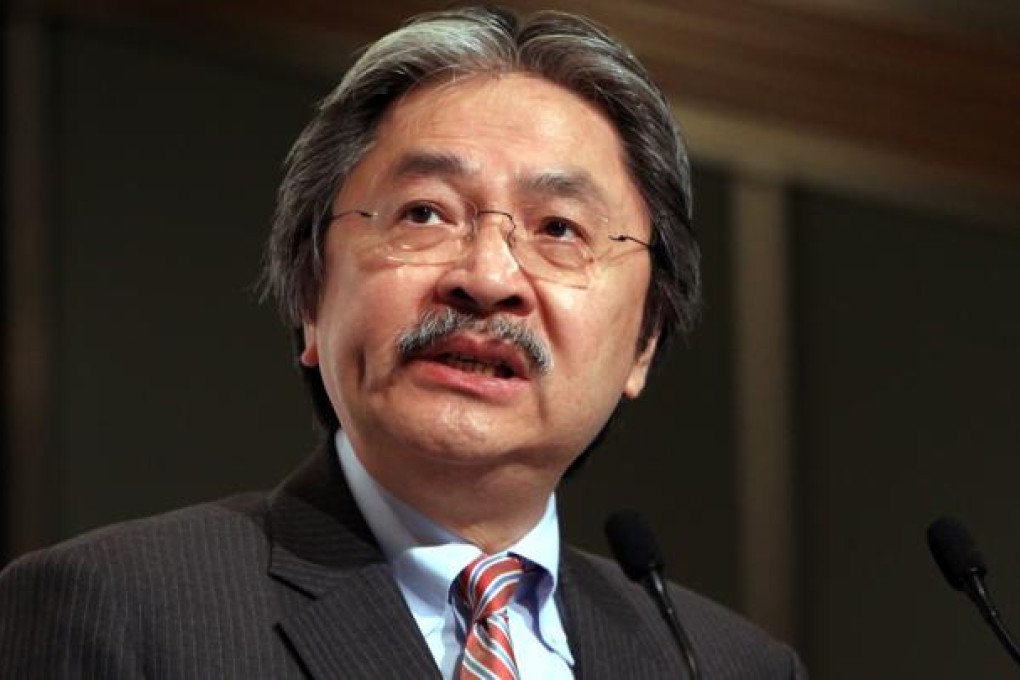 Financial Secretary John Tsang Chun-wah announced a 15 per cent stamp duty on home purchases by non-locals and companies. Photo: Jonathan Wong