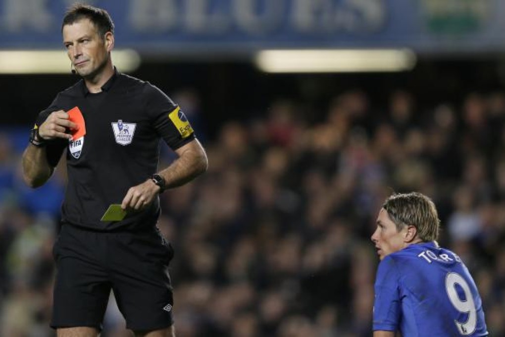 Fernando Torres is sent off after receiving a second yellow for diving, despite him appearing to have been tripped by Jonny Evans, during the clash at Stamford Bridge. Photo: AP