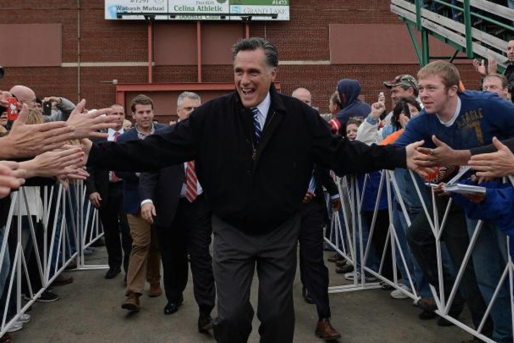 Mitt Romney greets supporters in Celina, Ohio. Photo: AFP