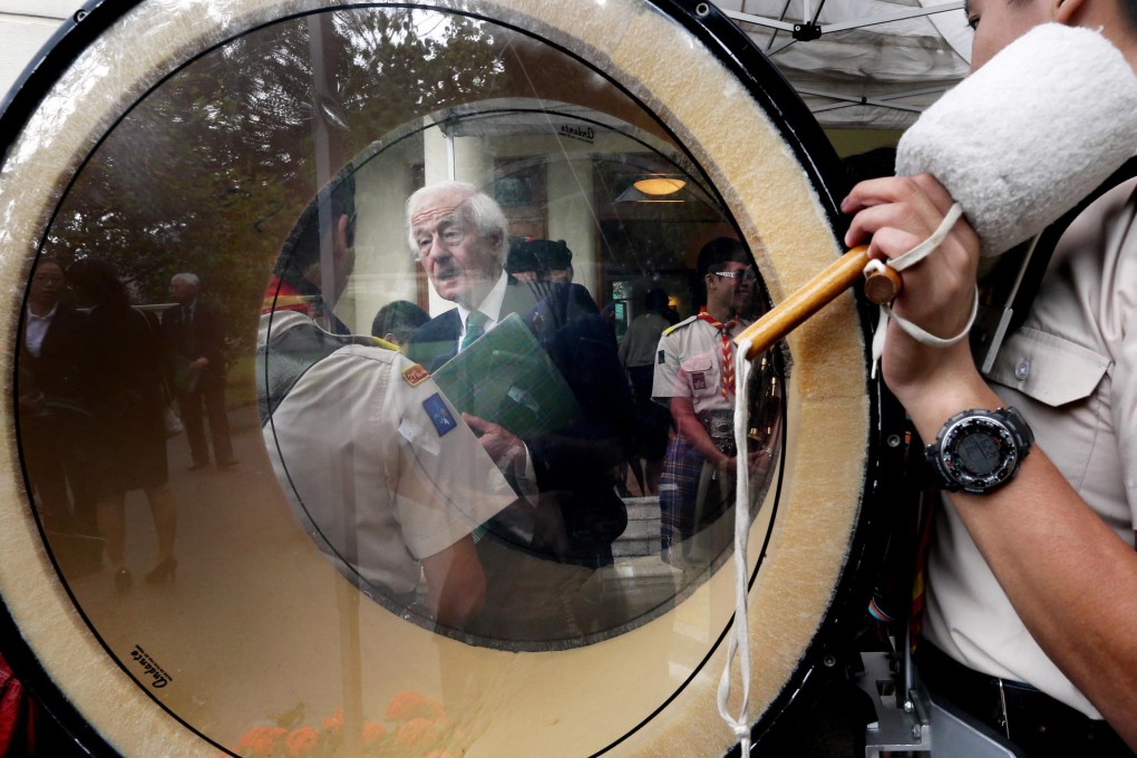 David Wilson chats with a Boy Scout at the University of Hong Kong yesterday. Photo: David Wong