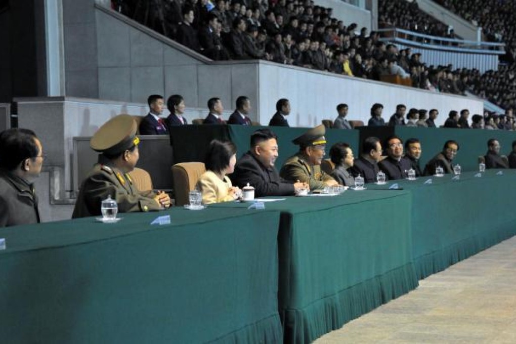 Ri Sol-ju and her husband drew "thunderous applause" at the soccer match. Photo: AFP