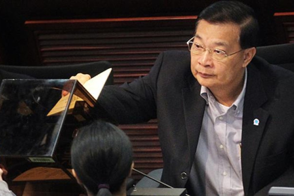 DAB chairman Tam Yiu-chung submits his vote in a Legco poll earlier this month. Photo: K.Y. Cheng