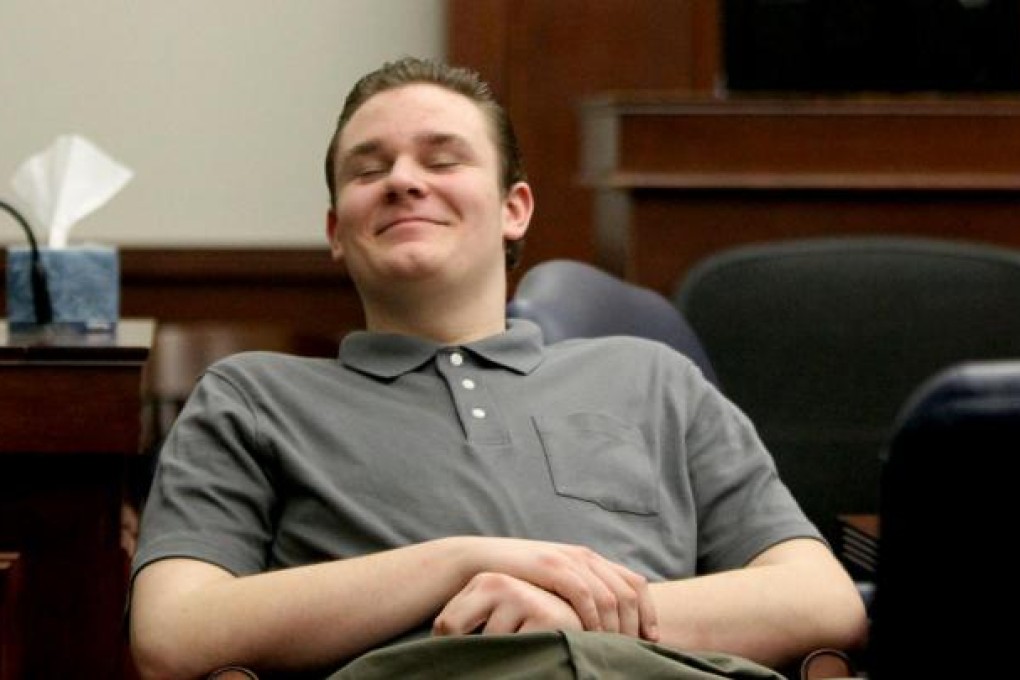 Brogan Rafferty flashes a smile while talking to his father during a break. Photo: MCT