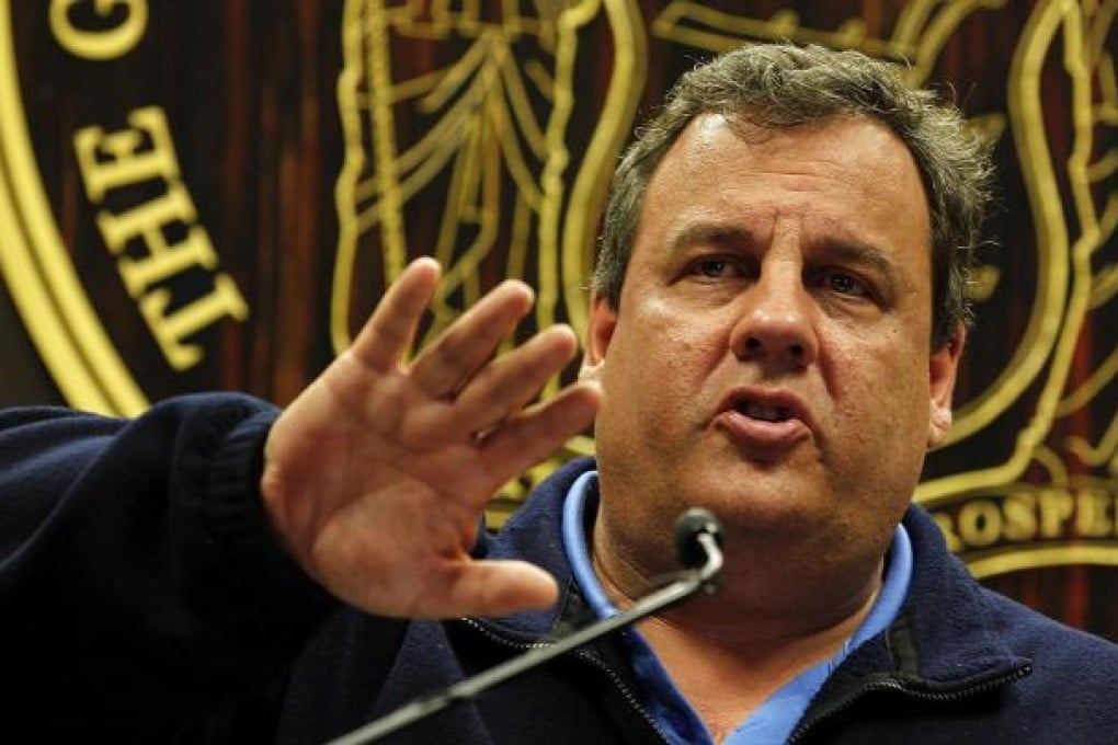Chris Christie, the Republican governor of New Jersey, praised President Barack Obama for his efforts amid the storm. Photo: AFP