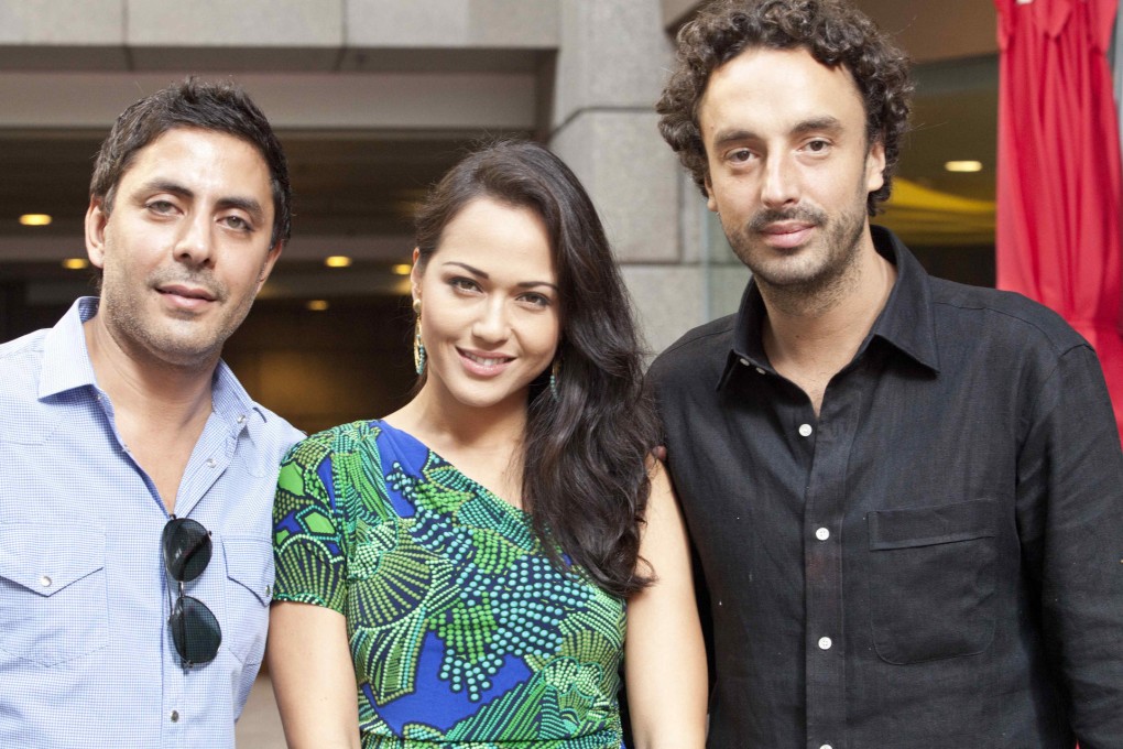 Party-goers Ravi Datwani, Ankie Beilke and Alex Charriol