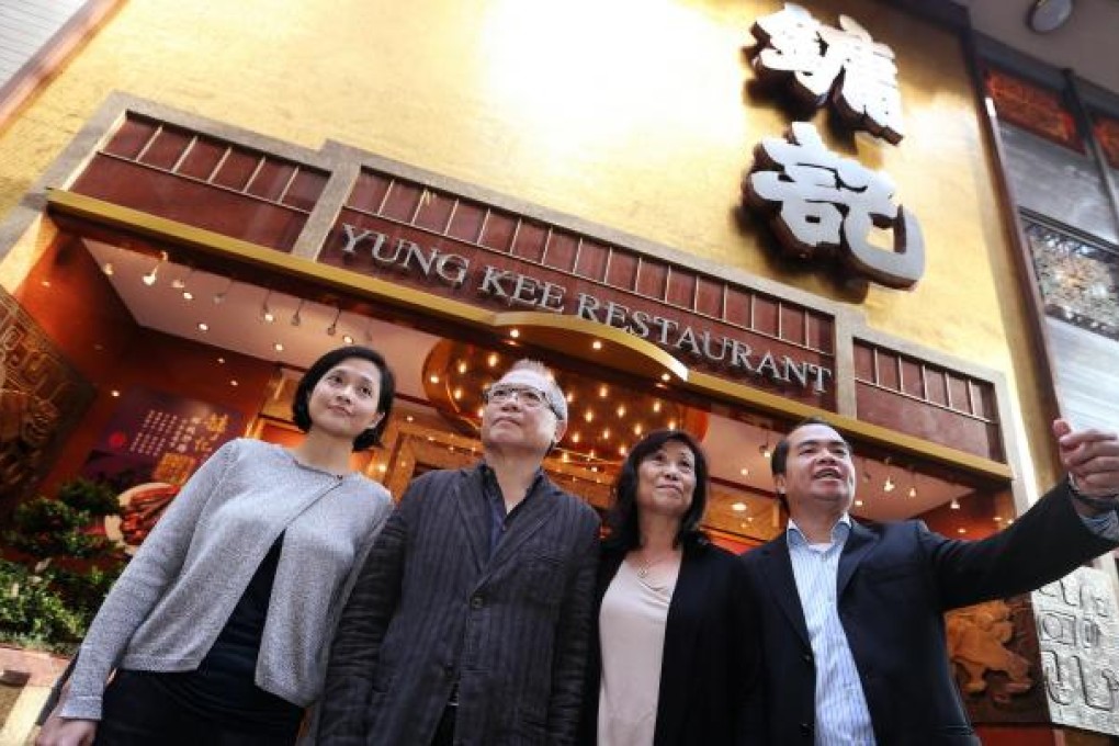 Outside Yung Kee in Central yesterday are Ronald Kam (second from left), his daughter Yvonne Kam (first left), sister Kelly Kam Mei-ling and son Carrel Kam. Photo: Sam Tsang