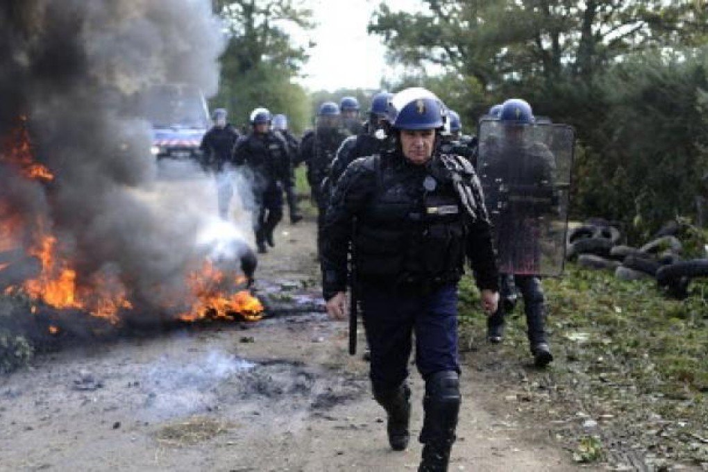 French gendarmes during a training exercise in Notre-Dame-des-Landes in western France. The country's appeals court has re-opened a trial of two police officers. Photo: AFP