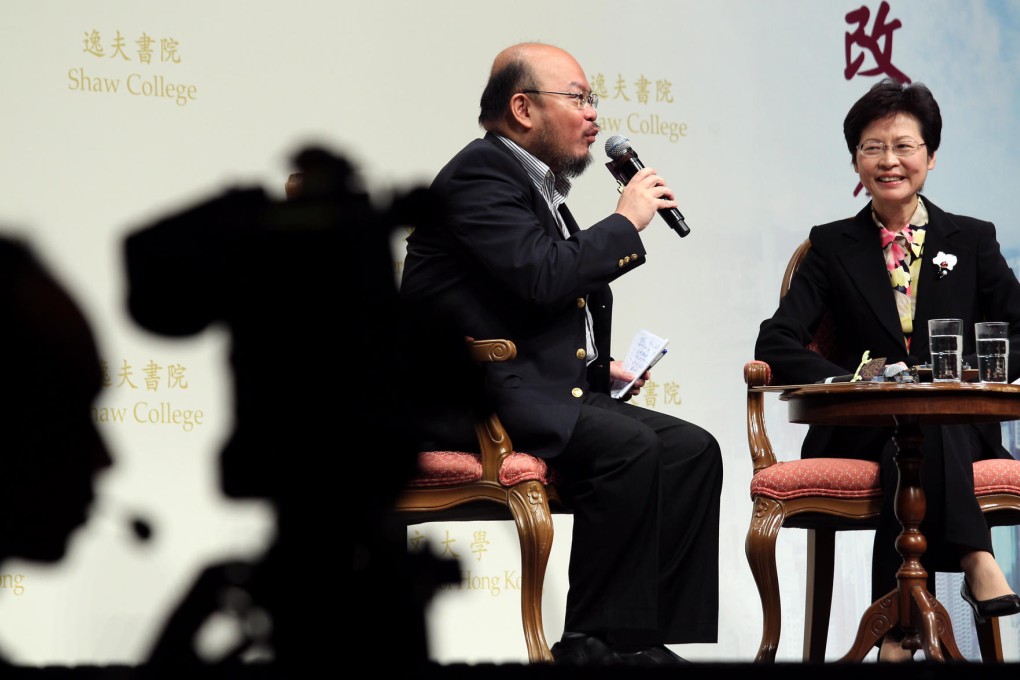 Chief Secretary Carrie Lam responds to questions from Chinese University political scientist Ivan Choy Chi-keung yesterday. Photo: Dickson Lee