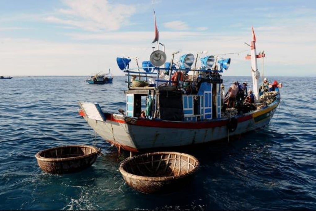 Fishing vessels prepare to leave from Ly Son Island to fish in waters off the disputed Paracel and Spratly islands. Photo: AFP