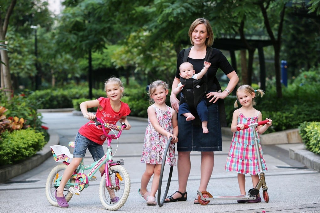 Naomi Tempany on the go with her brood. Photo: David Wong