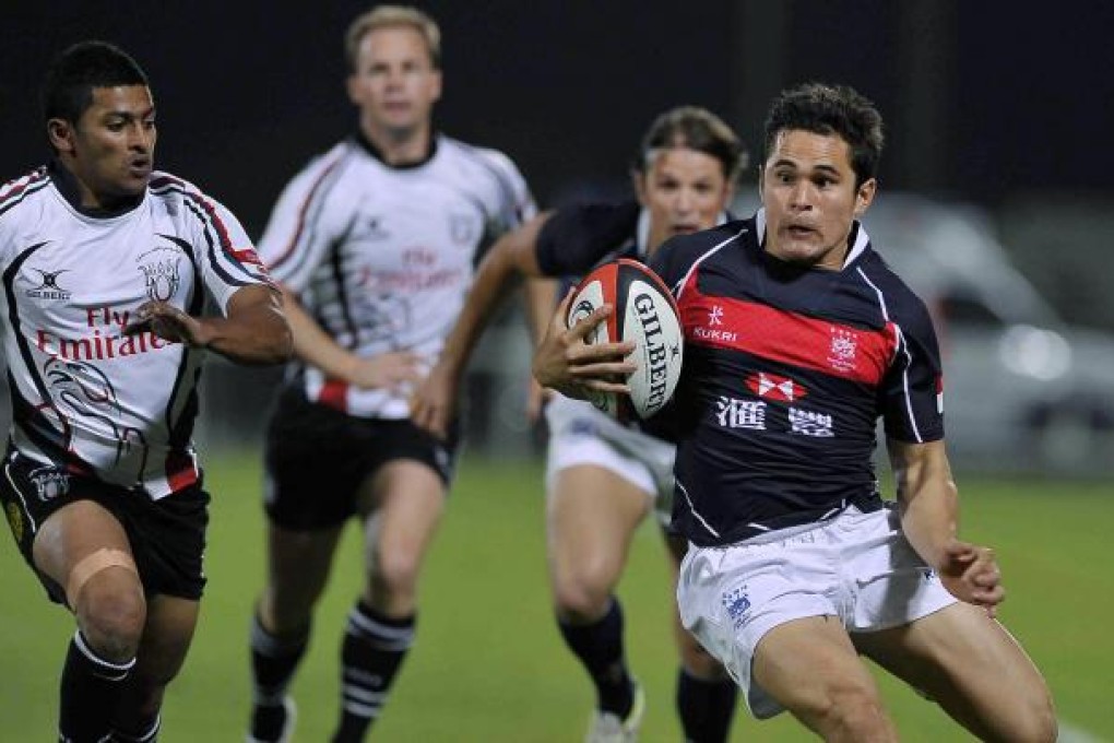 Hong Kong winger Rowan Varty (right) opens HSBC A5N account with 4 tries v UAE. Photo: SCMP