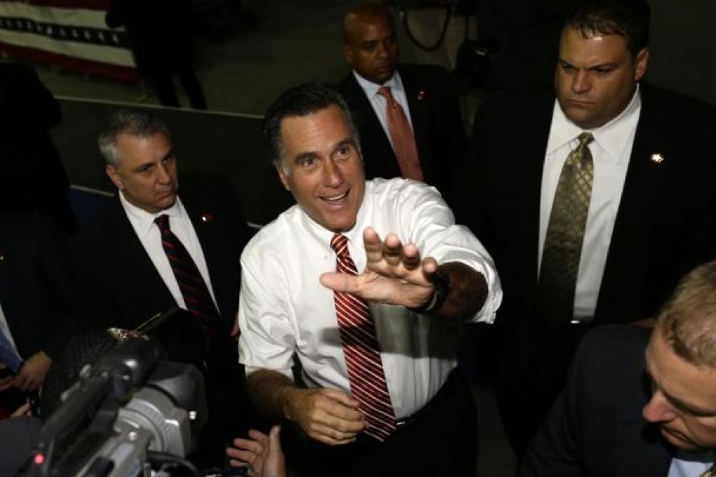 Mitt Romney pledges to declare China a currency manipulator on his first day in the White House. Photo: AP