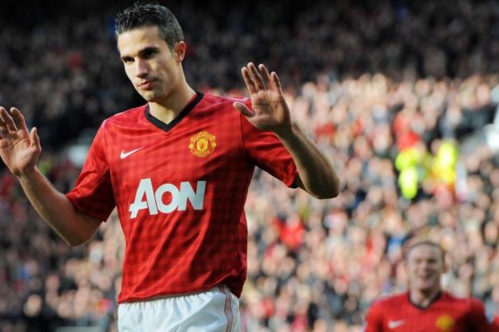 Manchester United forward Robin van Persie refuses to get carried away after scoring against his former team, Arsenal. Photo: AFP