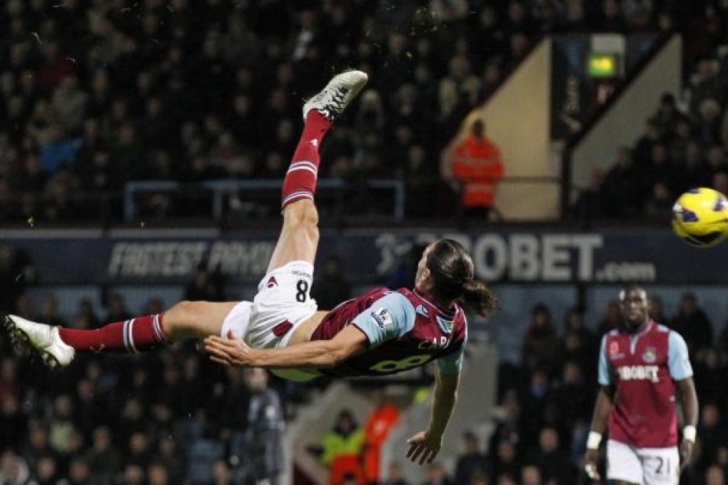 West Ham's Andy Carroll attempts an overhead kick at goal against Manchester City during their 0-0 English Premier League clash at Upton Park. Photo: AP