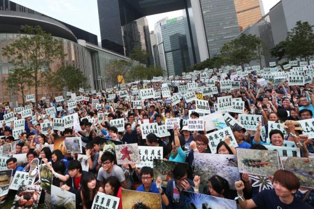 Yesterday's rally in Admiralty against officials' plan to build a beach at Lung Mei. Photo: Sam Tsang