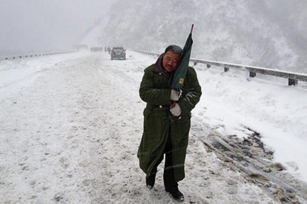 Snow covers a highway in Yanqing county, Beijing, on Sunday. Photo: EPA