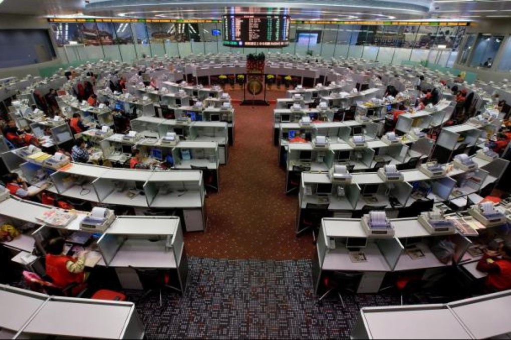 Investors have pushed the Hang Seng Index to a 15-month high, after the United States announced a new round of quantitative easing in September. Photo: Bloomberg