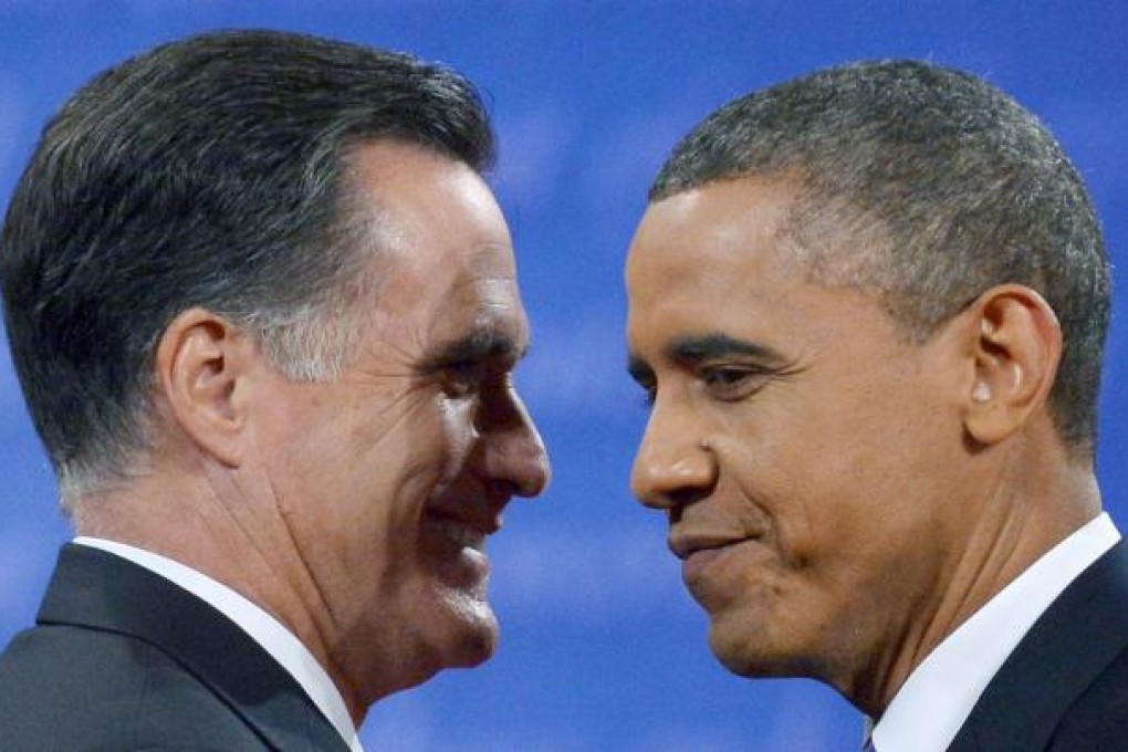 Romney and Obama after their third televised debate in Boca Raton, Florida, in the closing stages of an ugly and gritty campaign. Photo: AFP