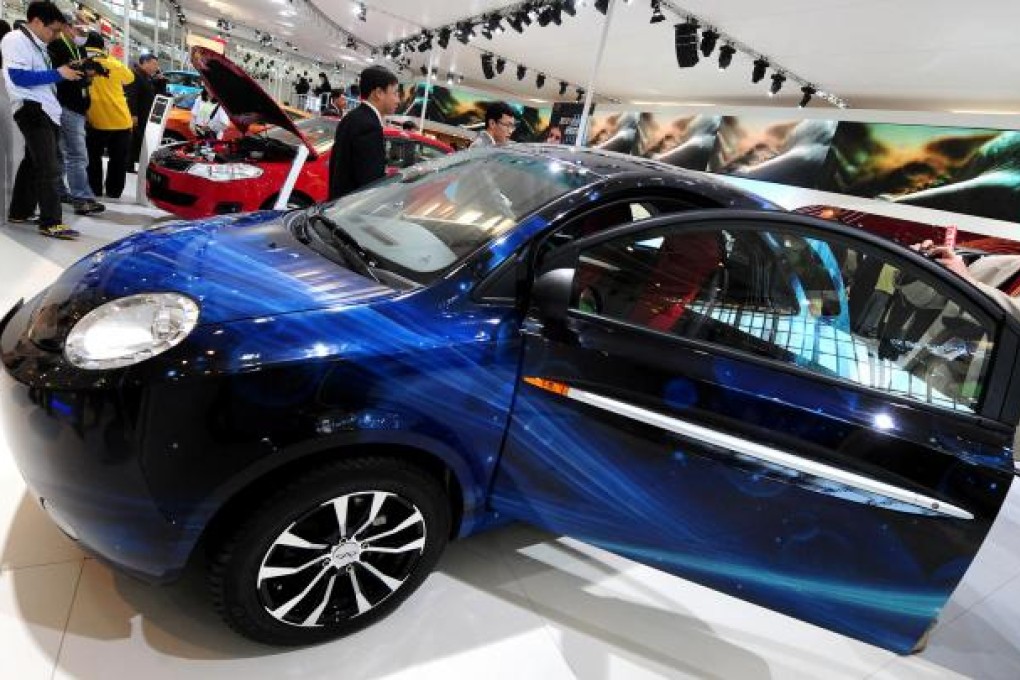 Chery's QQme at a car show. The firm will take advantage of its new partner's production and management experience to move to the higher end of the market. Photo: AFP