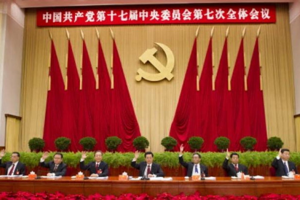 Chinese senior leaders Hu Jintao (centre) Wu Bangguo (third right) Wen Jiabao (third left) Jia Qinglin (second right) Li Changchun (second left) Xi Jinping (right) Li Keqiang (left) at the Seventh Plenary Session in Beijing. Photo: AP