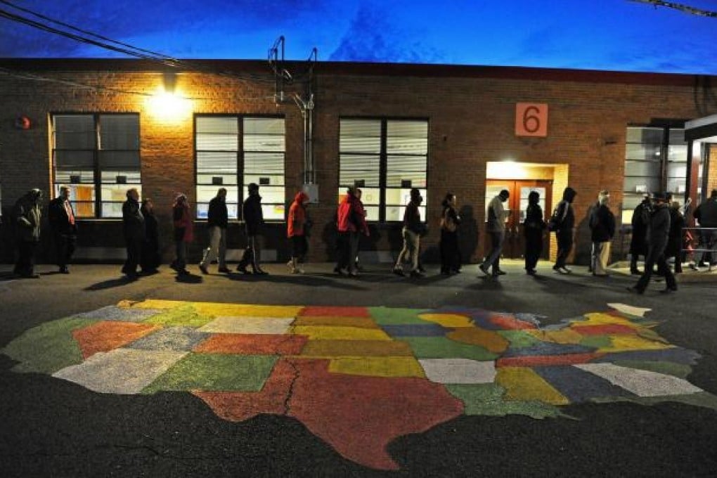 People line up to vote at a school in Virginia. Photo: AFP