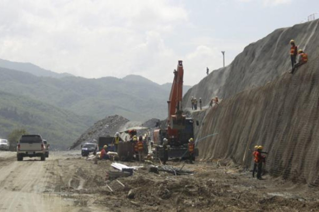 Construction workers prepare the site of the controversial Xayaburi dam in Laos on 28 September. Photo: EPA