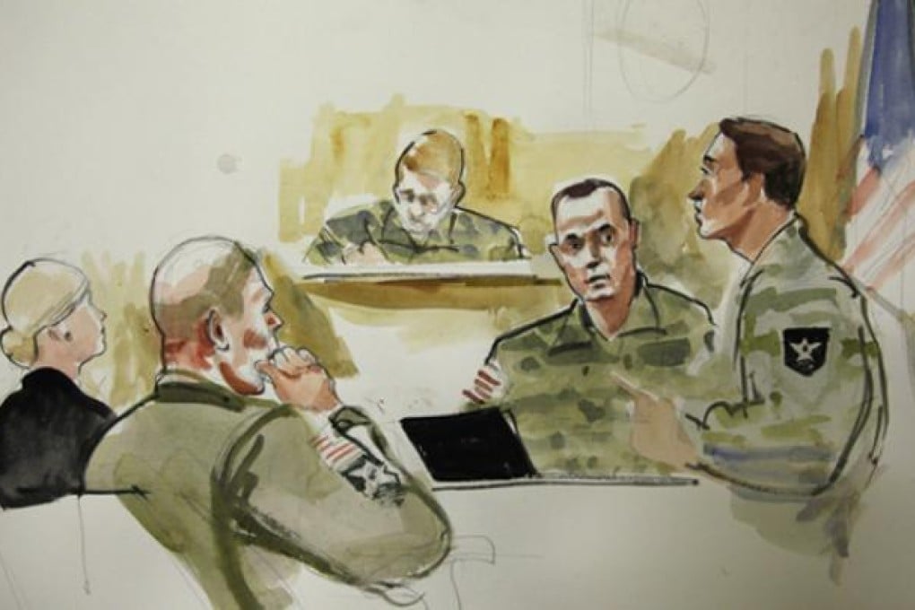 US Army Staff Sargeant Robert Bales (second from left) is shown during a preliminary hearing in a military courtroom in Washington state on Monday. Photo: AP