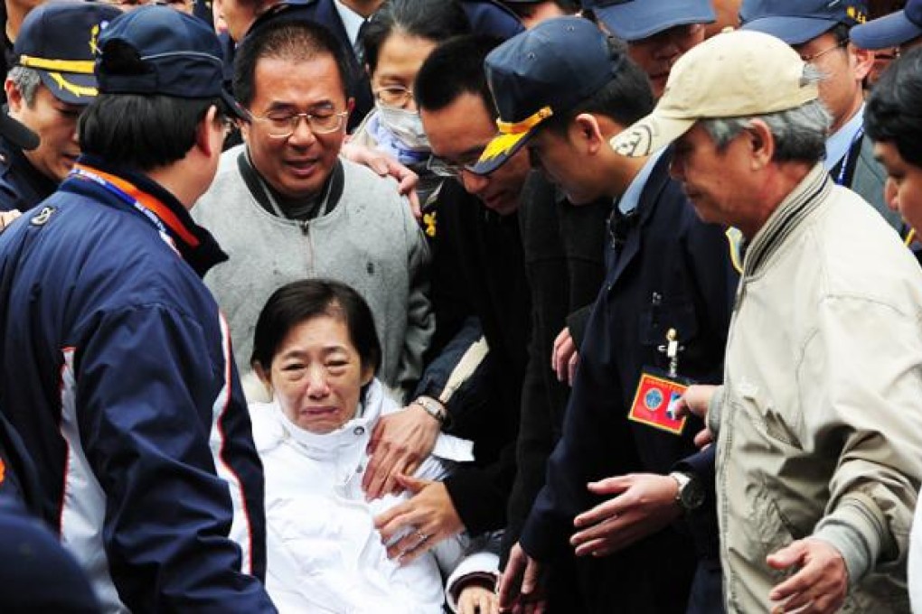Former Taiwan president Chen Shui-bian (second left) and wife Wu Shu-chen (bottom) in January. Photo: AFP