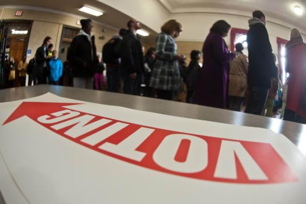 Americans head to the polls to decide one of the closest, most bitterly - fought presidential elections in years. Photo: AFP
