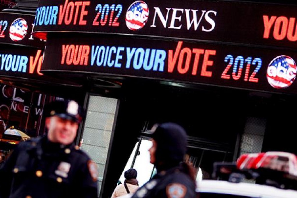 A Times Square billboard tells voters to go to the polls in New York. Photo: Xinhua
