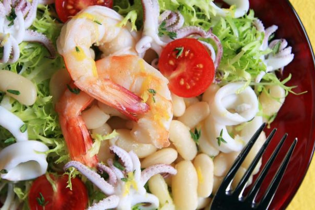 Warm cannellini beans with shrimp, squid and frisee