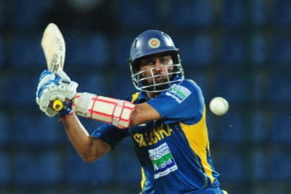 Sri Lankan cricketer Tillakaratne Dilshan plays a shot during the second One Day International (ODI) match between Sri Lanka and New Zealand at The Pallekele International Cricket Stadium. Photo: AFP