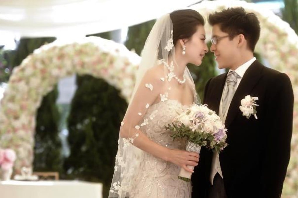 Guo Jingjing and Kenneth Fok share a special moment during the ceremony at the Fok family mansion in Pok Fu Lam. Photo: SCMP