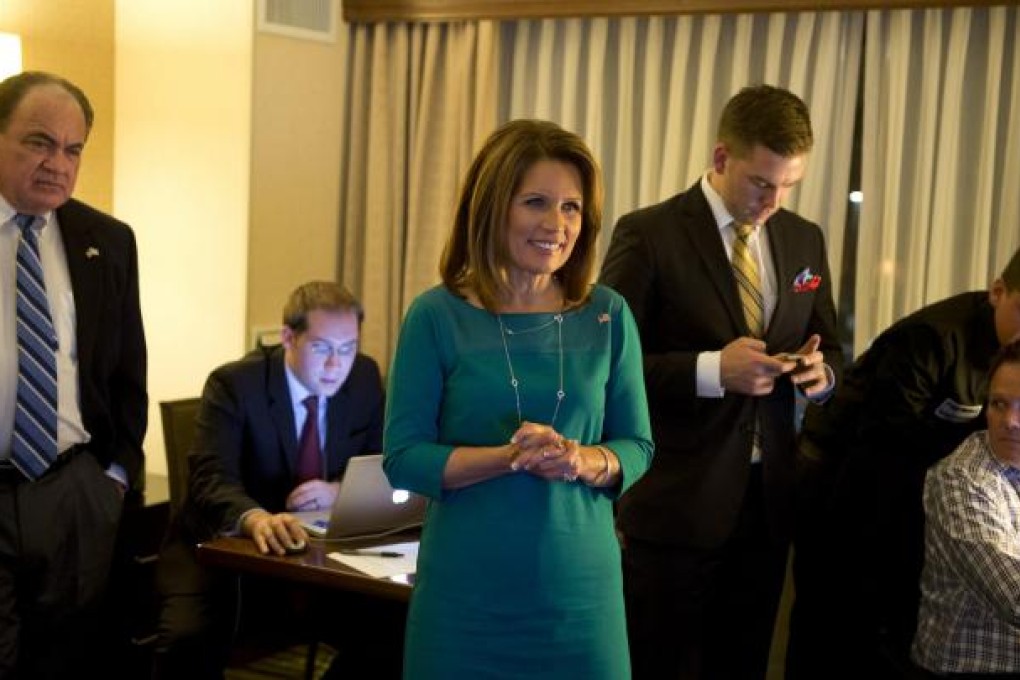 Bachmann watches election results at a hotel. Photo: MCT