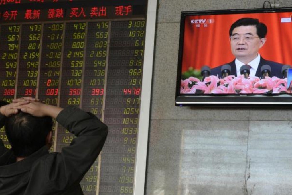 The market reacts as President Hu Jintao vows in Beijing yesterday to keep the GDP on track to double in size by 2020. Photo: Reuters