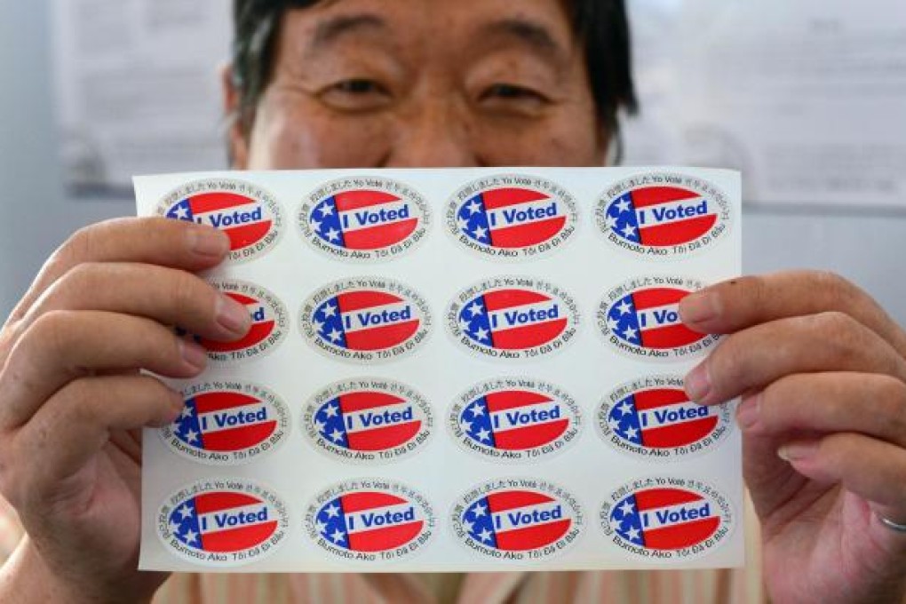 "I Voted" stickers were printed in multiple languages, as candidates tried to woo support from crucial minority groups. Photo: AFP